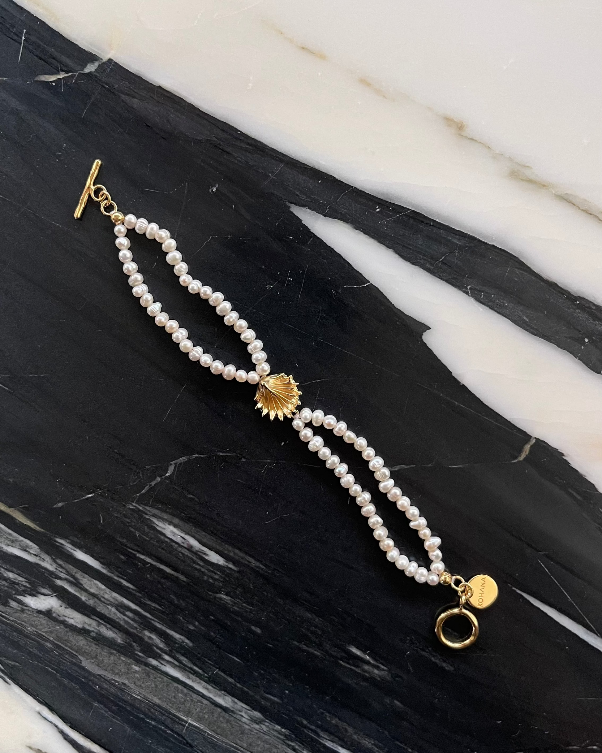 pearl bracelet with golden motif, handcrafted jewellery, jewelry from Bali 