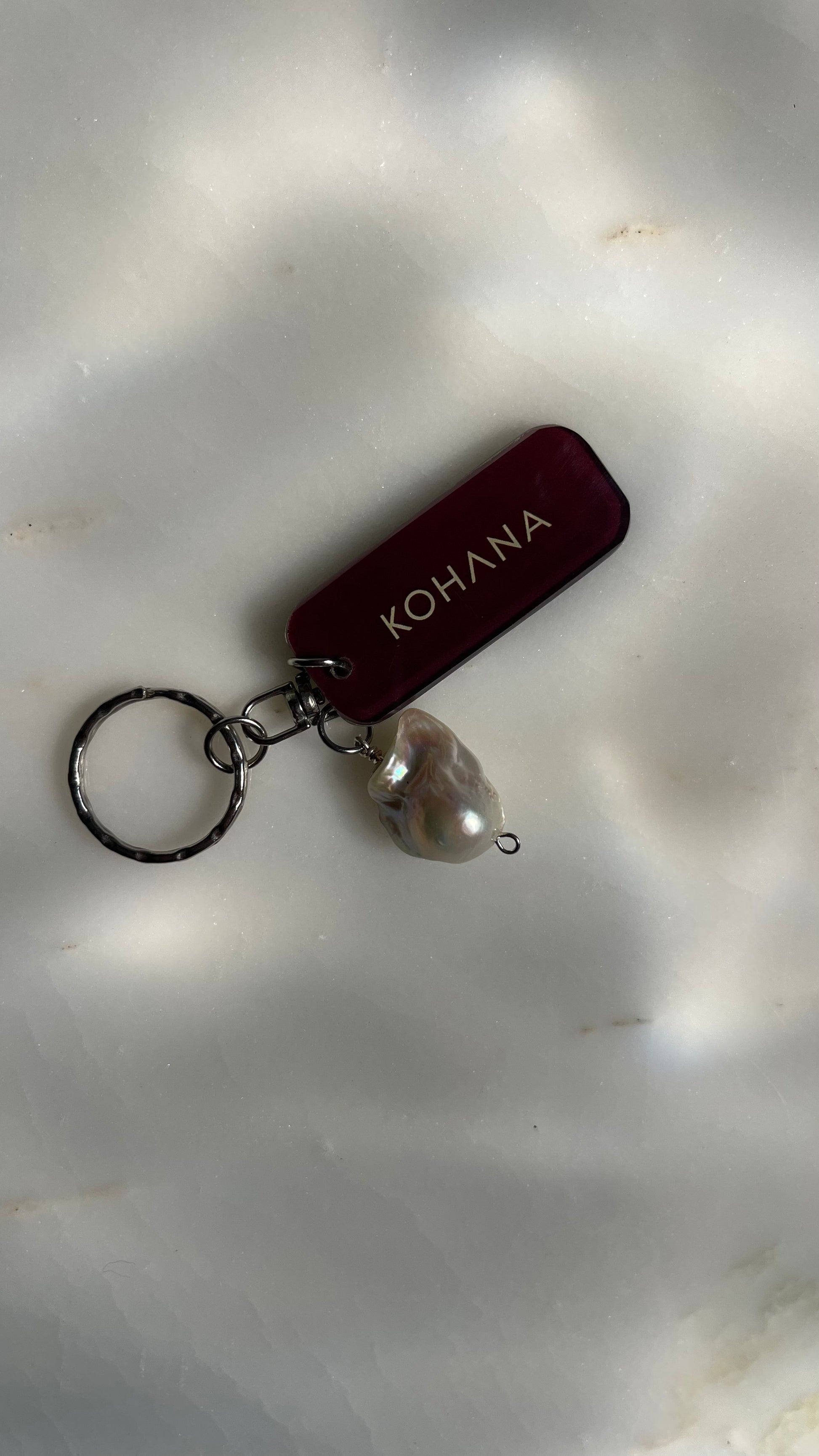 Purple Keychain with a pearl