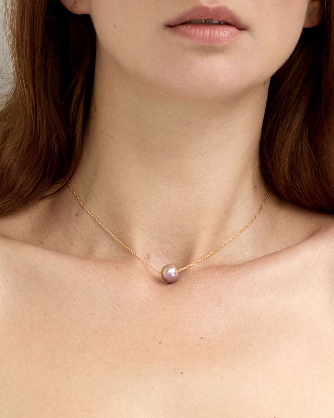 Necklace with a single pearl pendant, handcrafted jewelry with pearls